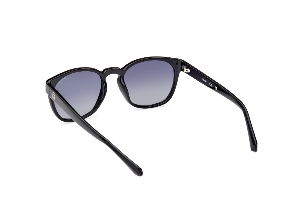 Occhiali da sole Guess GU00083-H (01D) colore nero lucido forma rotondo lenti fumo polar.