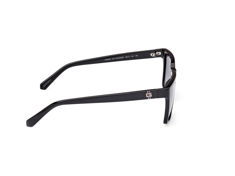 Occhiali da sole Guess GU00084 (01D) colore nero lucido forma quadrato lenti fumo polar.
