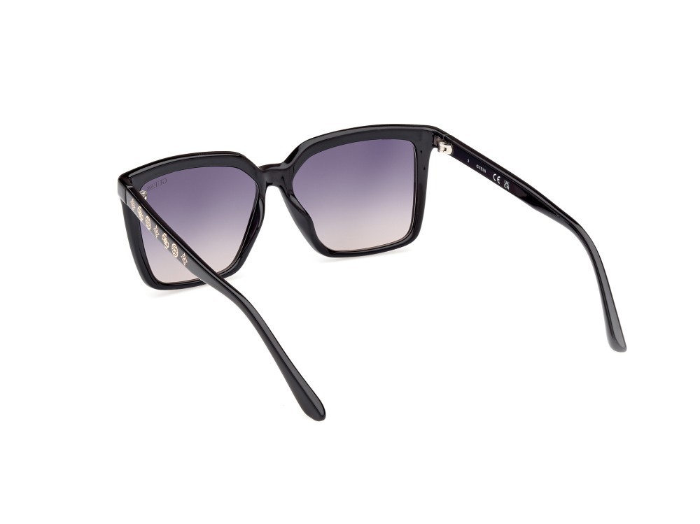 Occhiali da sole Guess GU00099 (01B) colore nero lucido forma quadrato lenti fumo grad.