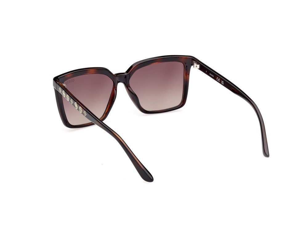 Occhiali da sole Guess GU00099 (52F) colore avana scura forma quadrato lenti marrone sfumato