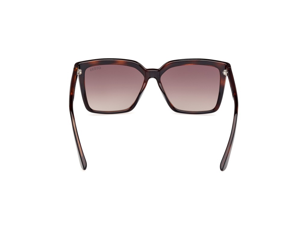 Occhiali da sole Guess GU00099 (52F) colore avana scura forma quadrato lenti marrone sfumato