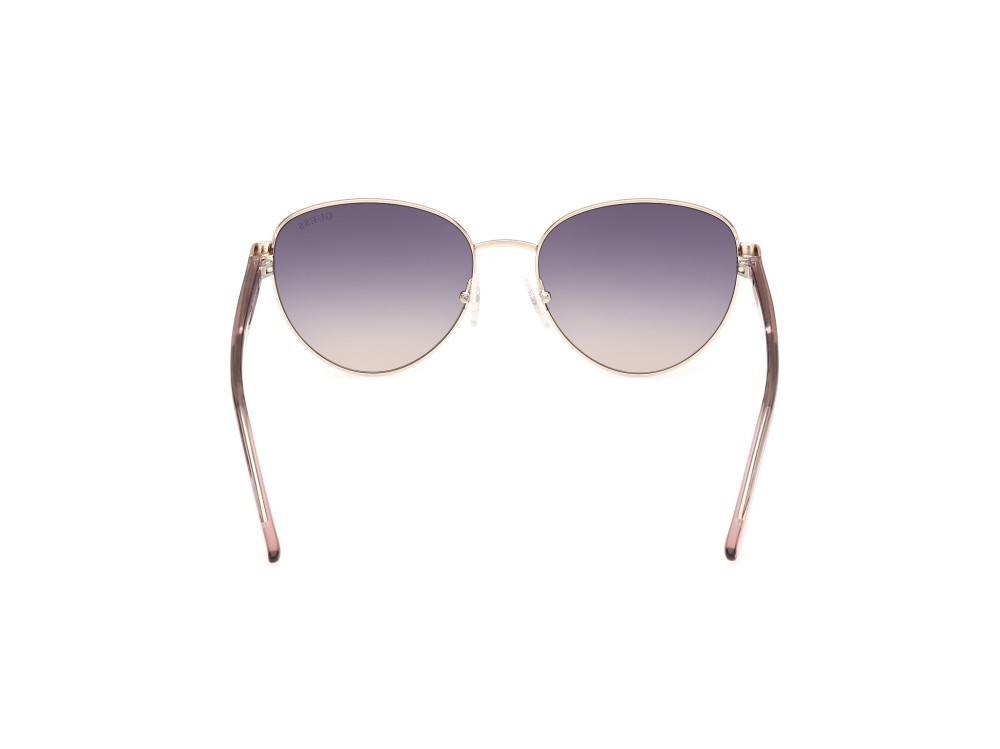 Occhiali da sole Guess GU00101 (20B) colore grigio lucido forma rotondo lenti fumo grad.