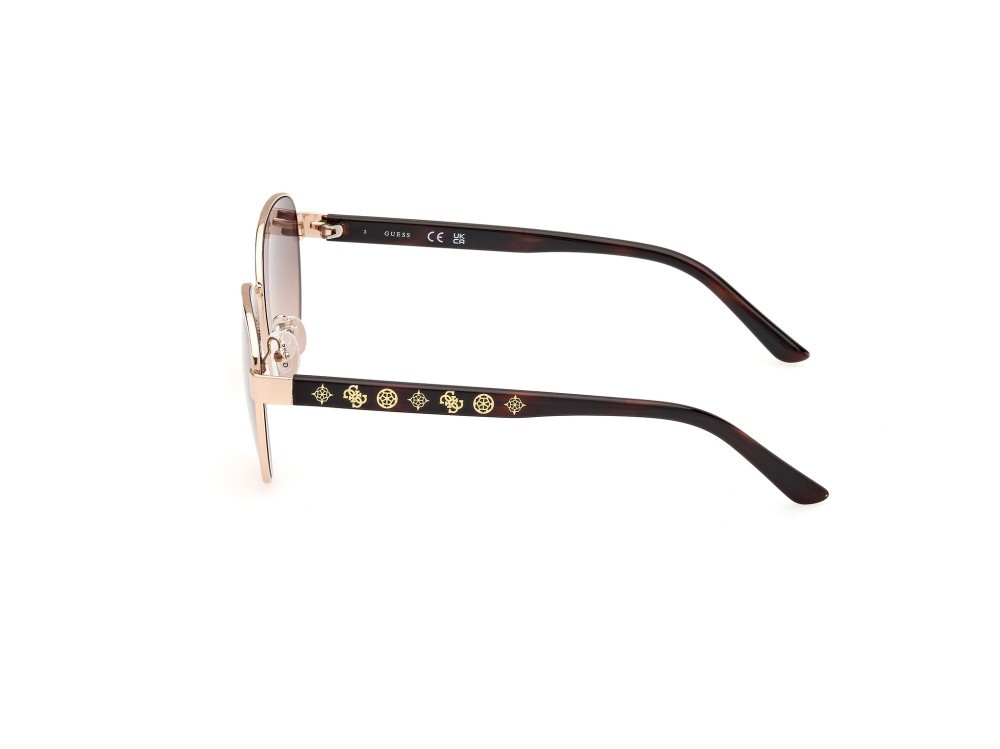 Occhiali da sole Guess GU00101 (32F) colore oro pallido lucido forma rotondo lenti marrone sfumato