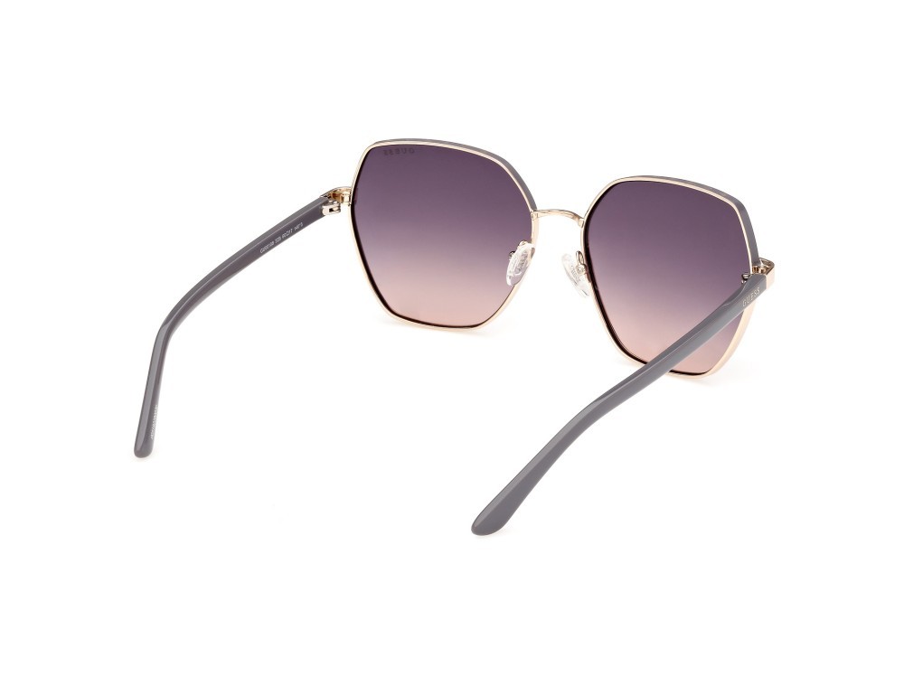 Occhiali da sole Guess GU00108 (32B) colore oro pallido lucido forma geometrico lenti fumo grad.