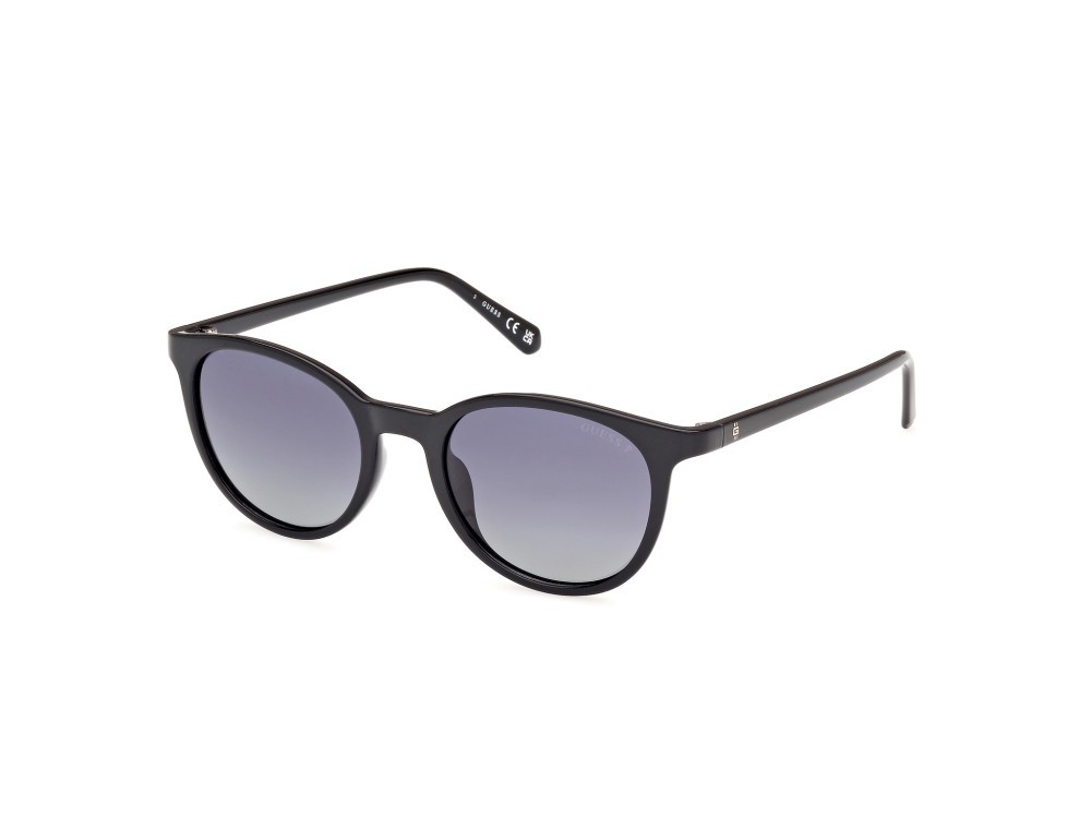 Occhiali da sole Guess GU00118 (01D) colore nero lucido forma rotondo lenti fumo polar.