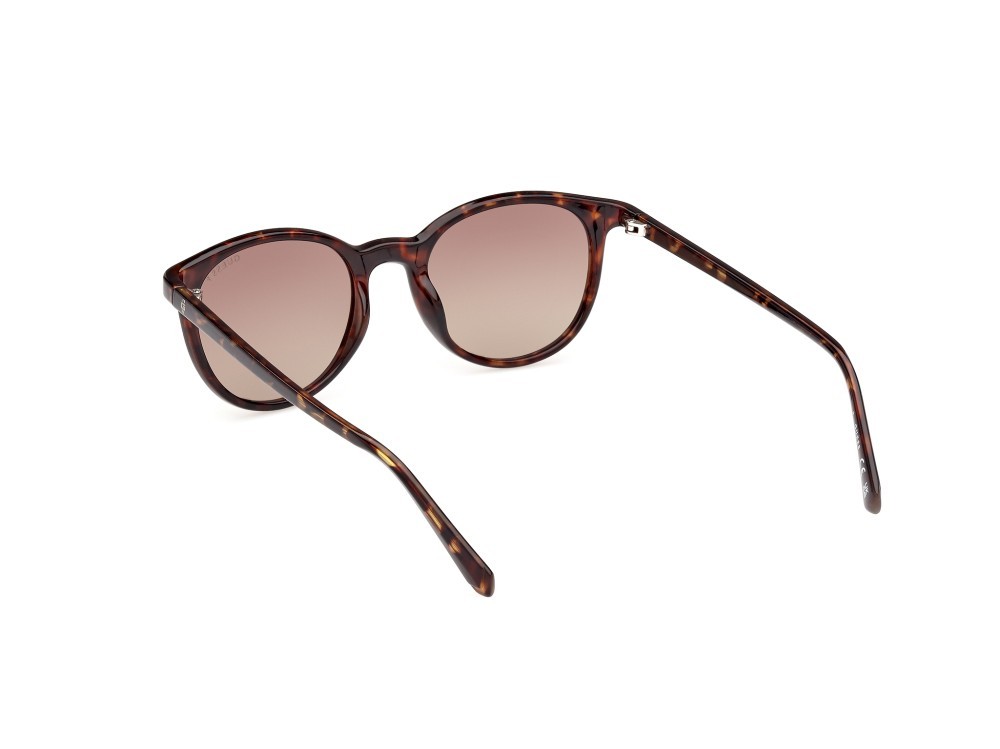 Occhiali da sole Guess GU00118 (52H) colore avana scura forma rotondo lenti marrone polar.