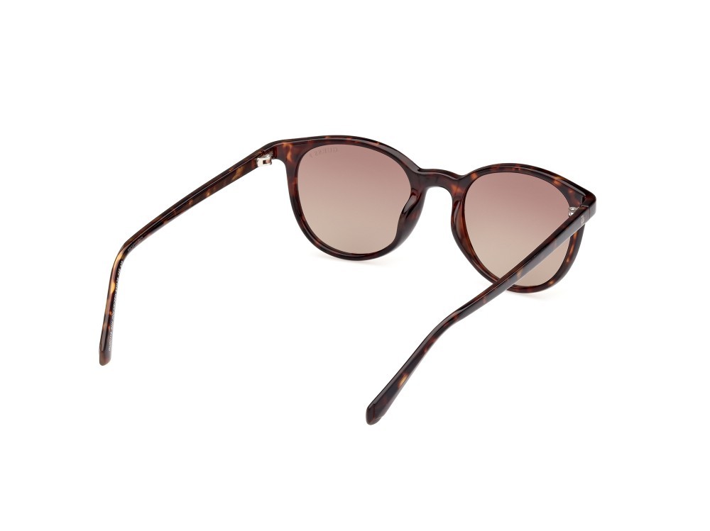 Occhiali da sole Guess GU00118 (52H) colore avana scura forma rotondo lenti marrone polar.