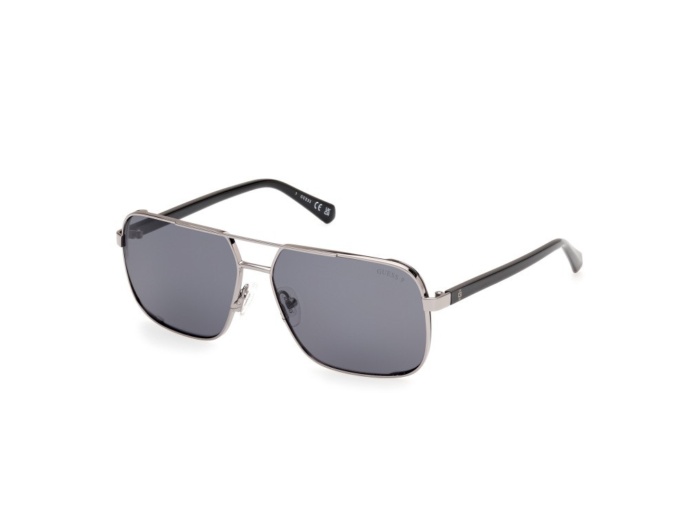 Occhiali da sole Guess GU00119 (08D) colore antracite lucido forma navigator lenti fumo polar.