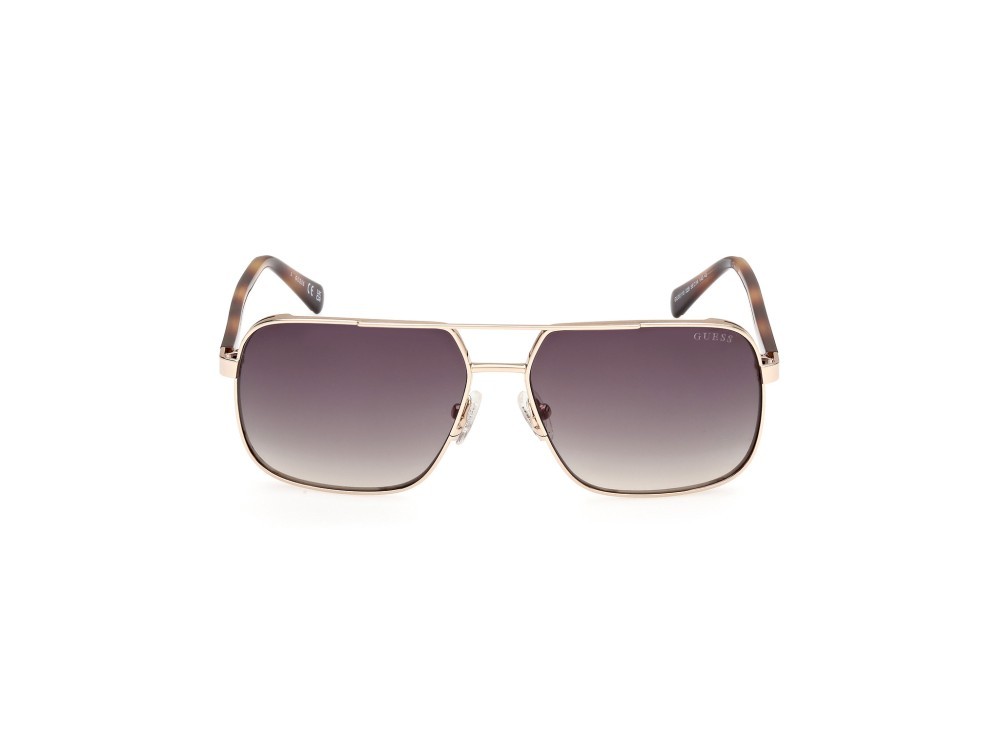 Occhiali da sole Guess GU00119 (32B) colore oro pallido lucido forma navigator lenti fumo grad.