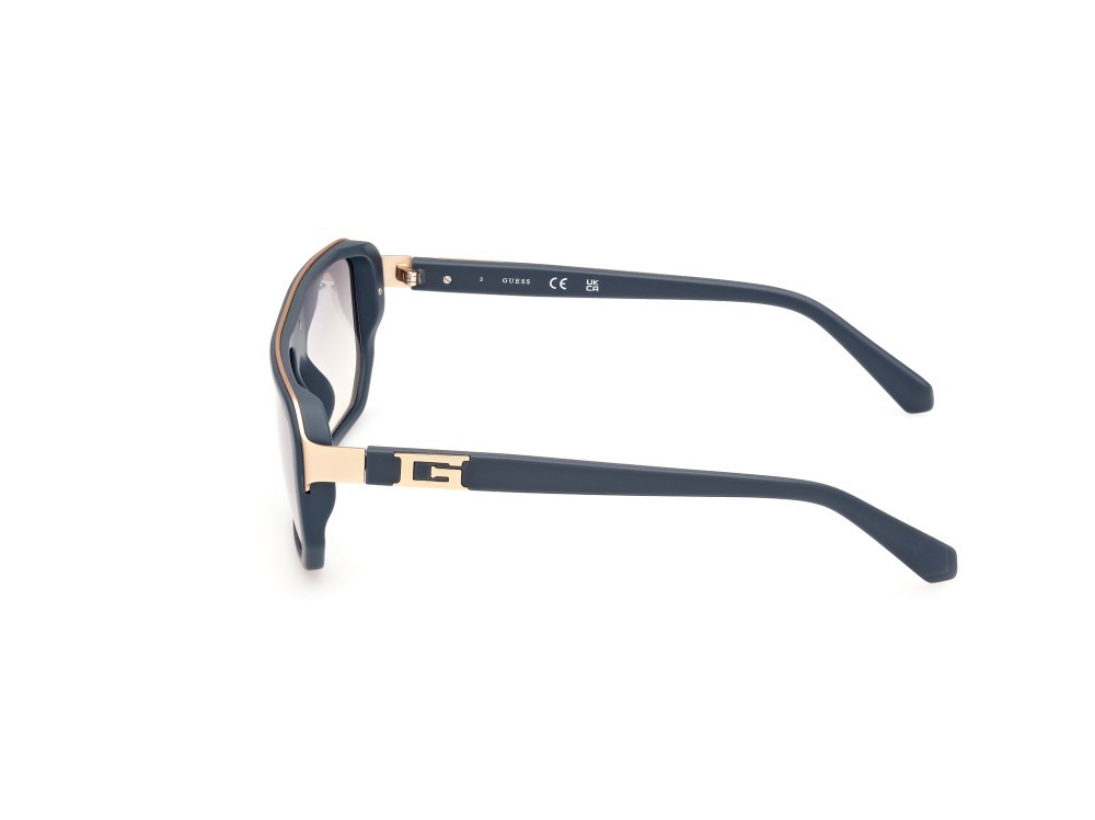 Occhiali da sole Guess GU00124 (20C) colore grigio opaco forma geometrico lenti fumo specchiato