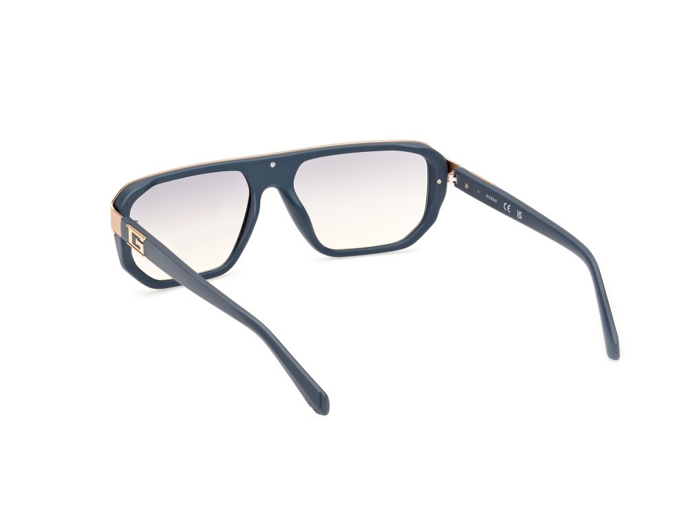 Occhiali da sole Guess GU00124 (20C) colore grigio opaco forma geometrico lenti fumo specchiato