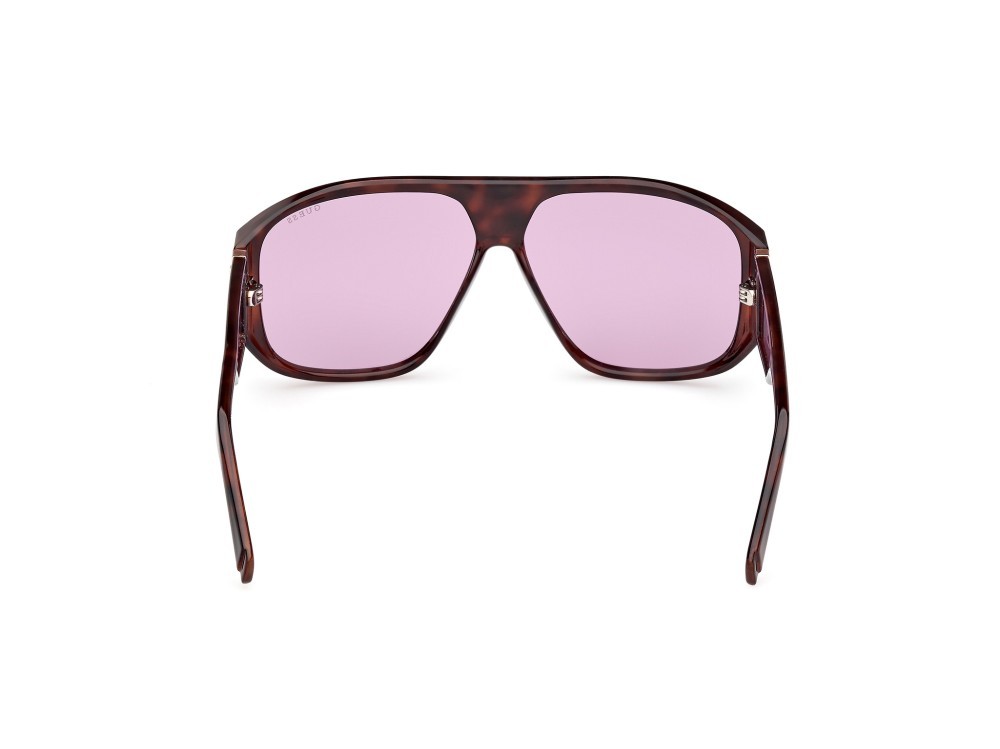 Occhiali da sole Guess GU00135 (52Y) colore avana scura forma mask lenti viola