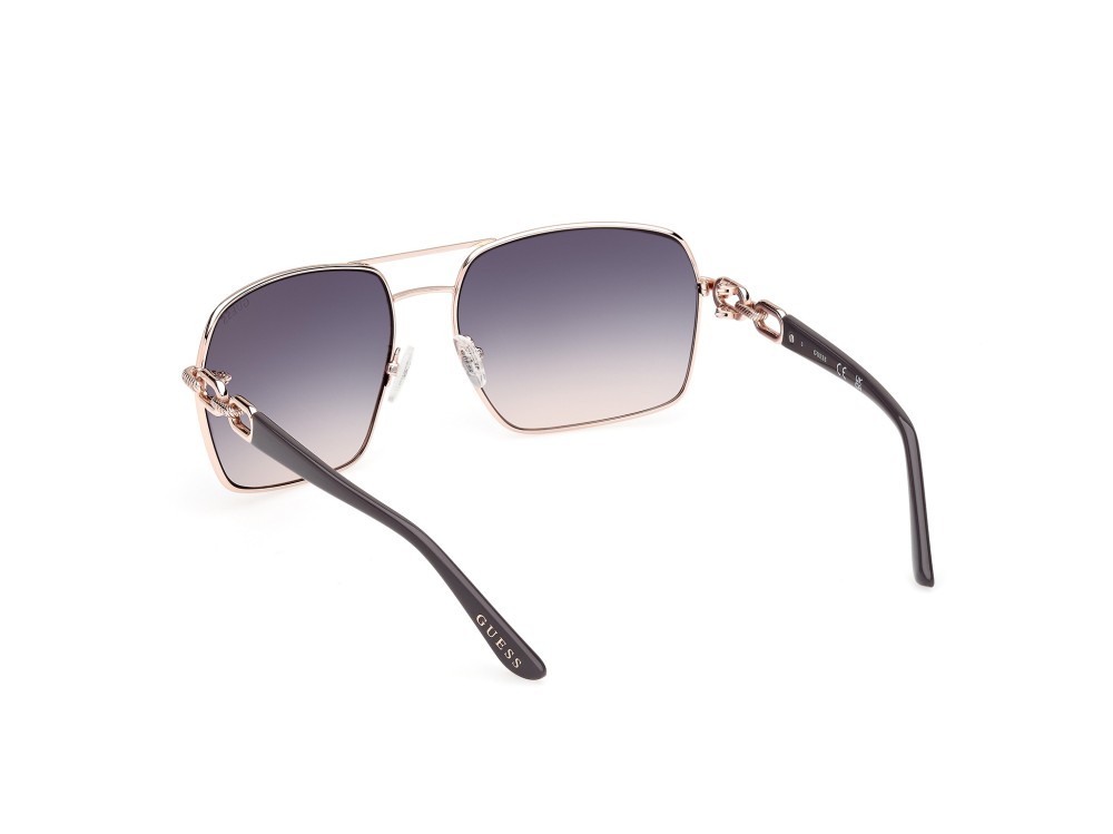 Occhiali da sole Guess GU00159 (28W) colore oro rosè lucido forma navigator lenti blu sfumato