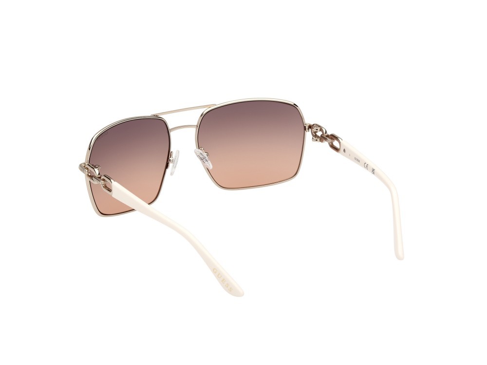 Occhiali da sole Guess GU00159 (32B) colore oro pallido lucido forma navigator lenti fumo grad.
