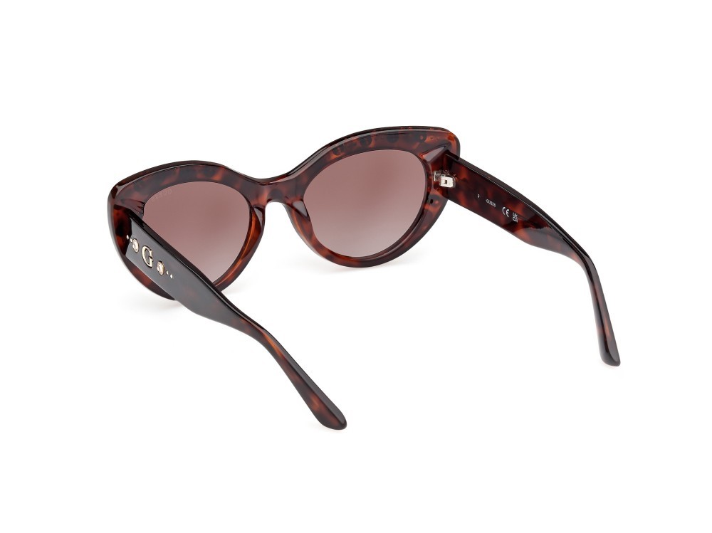 Occhiali da sole Guess GU00163 (52F) colore avana scura forma cat eye lenti marrone sfumato