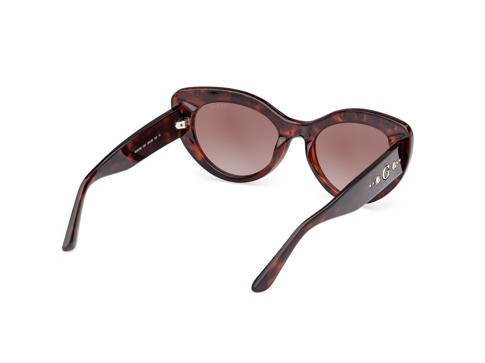 Occhiali da sole Guess GU00163 (52F) colore avana scura forma cat eye lenti marrone sfumato