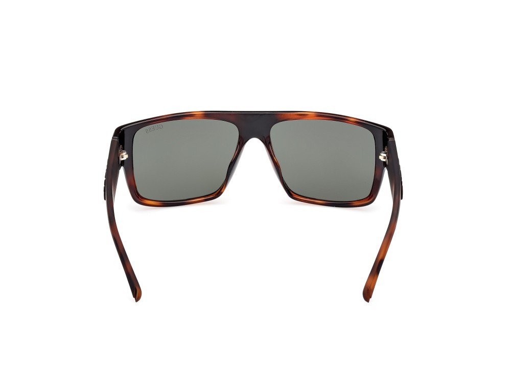 Occhiali da sole Guess GU00165 (52N) colore avana scura forma rettangolare lenti verde