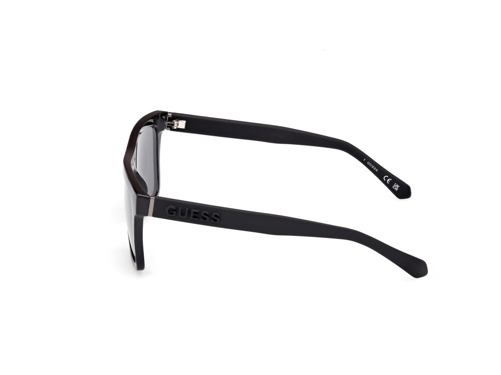 Occhiali da sole Guess GU00166 (01A) colore nero lucido - nero opaco forma quadrato lenti blu sfumato