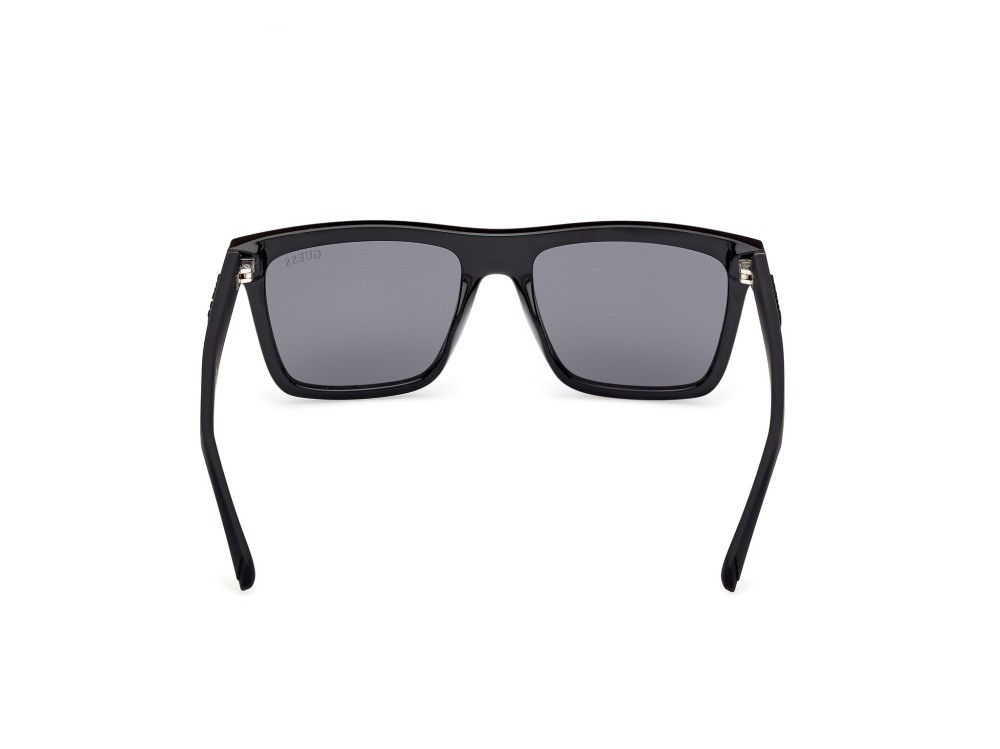 Occhiali da sole Guess GU00166 (01A) colore nero lucido - nero opaco forma quadrato lenti blu sfumato