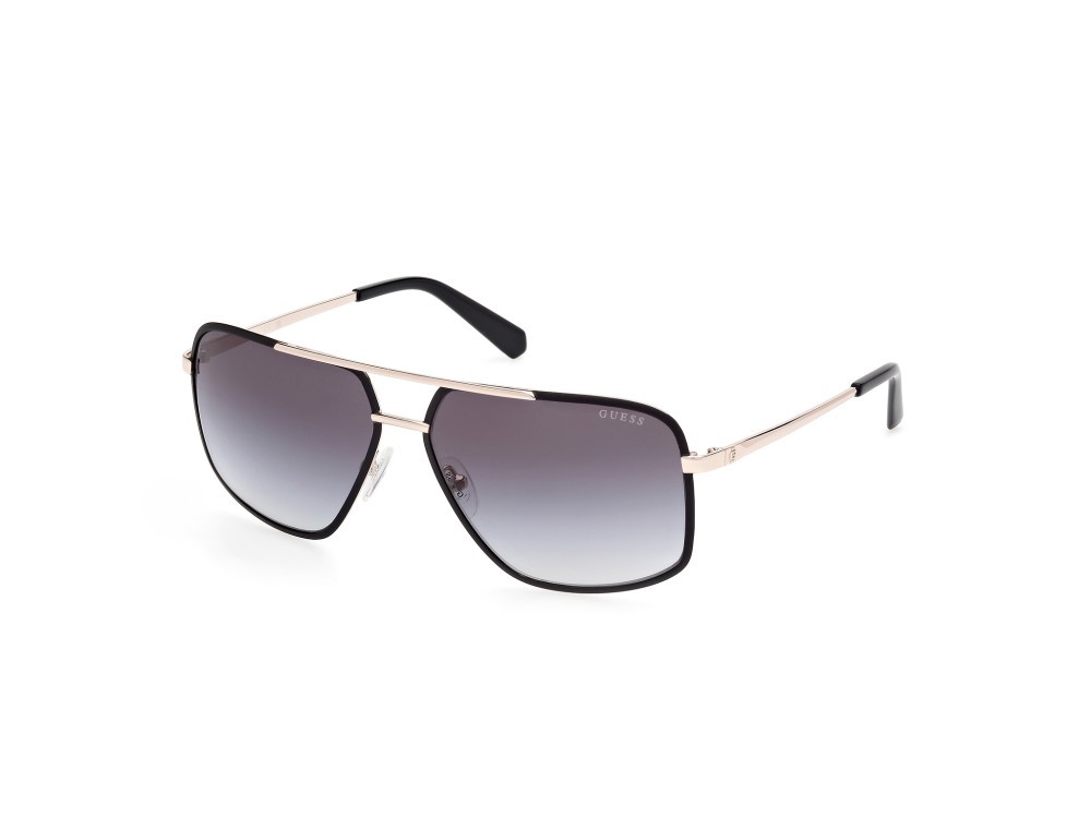 Occhiali da sole Guess GU00167 (02B) colore nero opaco - oro pallido lucido forma navigator lenti fumo grad.