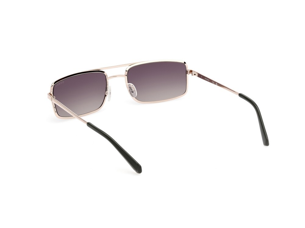 Occhiali da sole Guess GU00168 (97P) colore verde scuro opaco forma navigator lenti verde sfumato