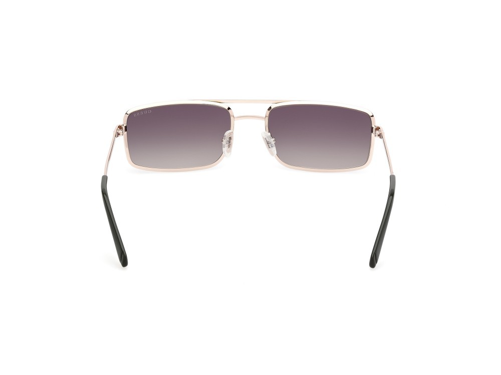Occhiali da sole Guess GU00168 (97P) colore verde scuro opaco forma navigator lenti verde sfumato