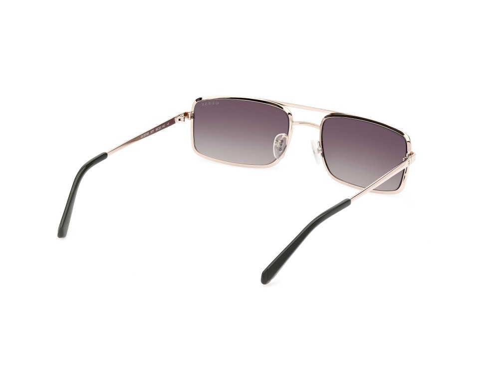 Occhiali da sole Guess GU00168 (97P) colore verde scuro opaco forma navigator lenti verde sfumato