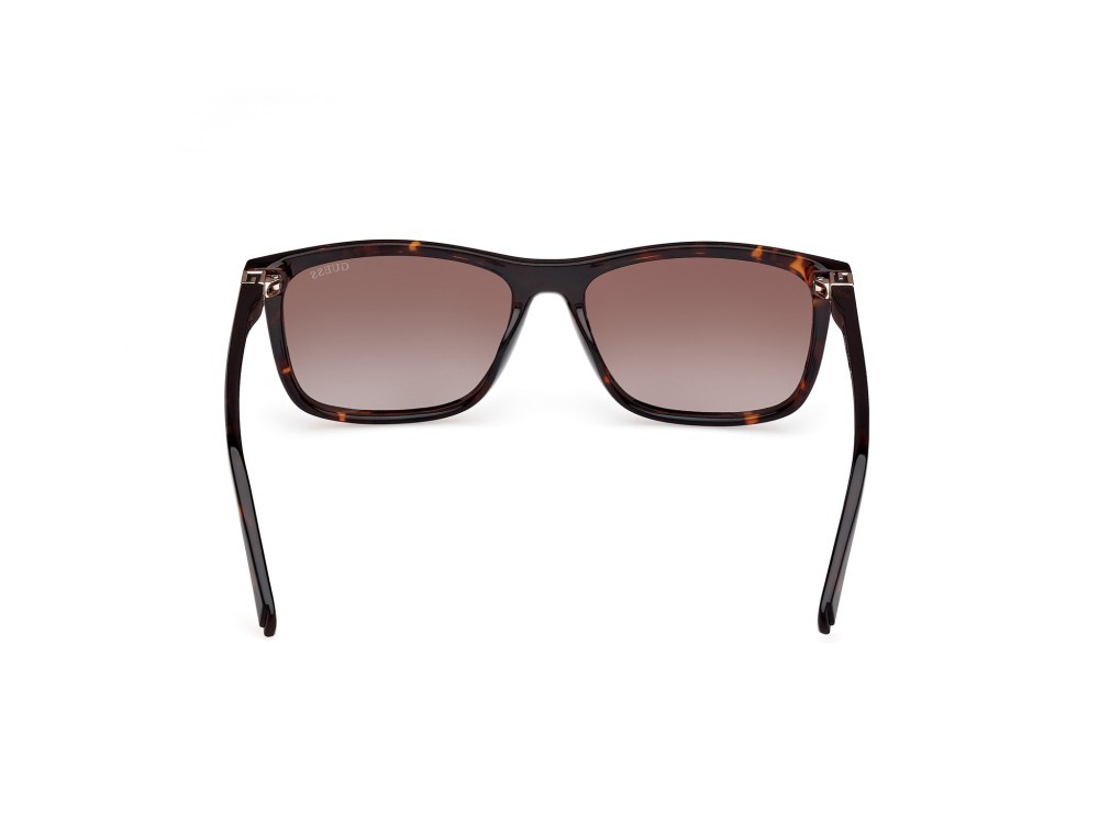 Occhiali da sole Guess GU00169 (52F) colore avana scura forma rettangolare lenti marrone sfumato