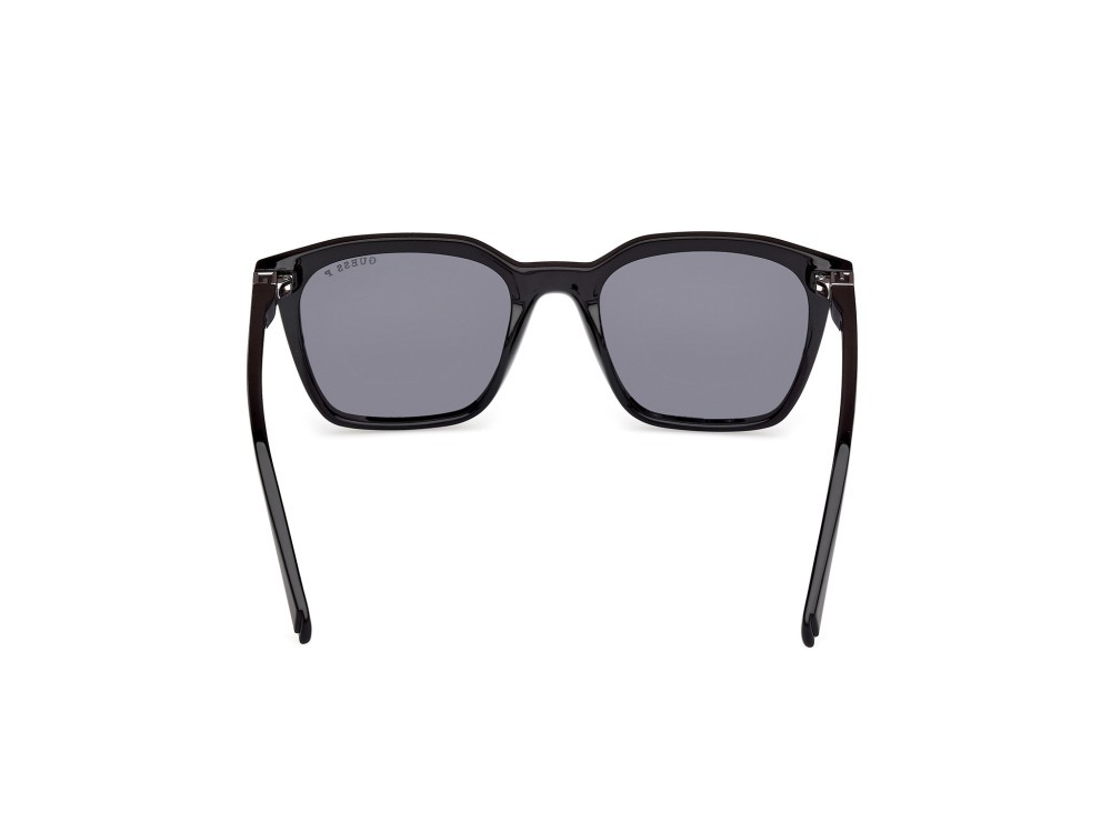Occhiali da sole Guess GU00170 (01D) colore nero lucido forma quadrato lenti fumo polarizzato