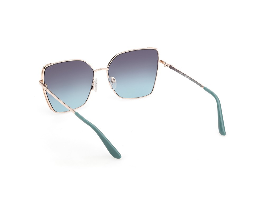Occhiali da sole Guess GU00192 (33W) colore oro pallido lucido forma farfalla lenti blu sfumato