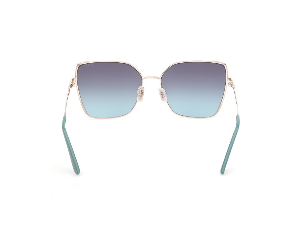 Occhiali da sole Guess GU00192 (33W) colore oro pallido lucido forma farfalla lenti blu sfumato