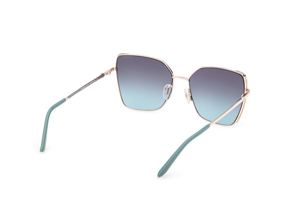 Occhiali da sole Guess GU00192 (33W) colore oro pallido lucido forma farfalla lenti blu sfumato