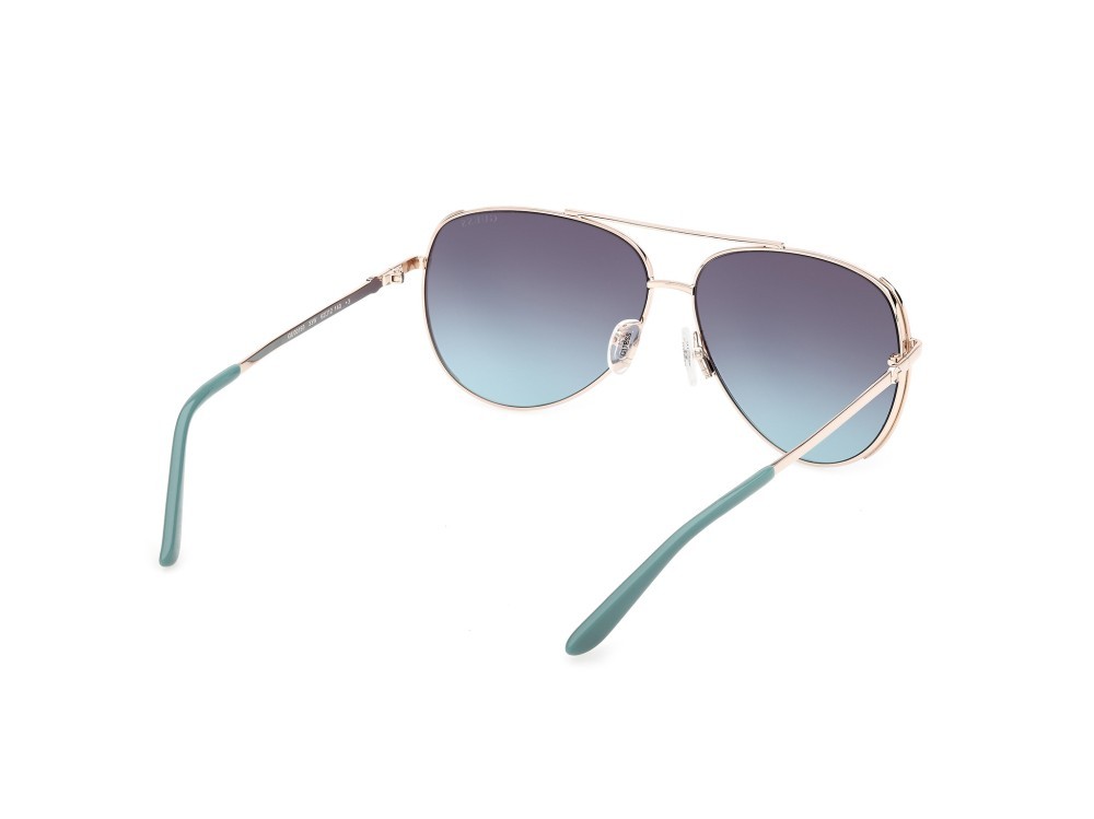 Occhiali da sole Guess GU00193 (33W) colore oro pallido lucido forma aviator lenti blu sfumato