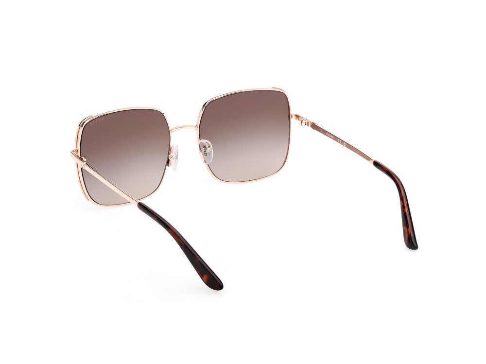 Occhiali da sole Guess GU00194 (28F) colore oro rosé lucido forma quadrato lenti marrone sfumato