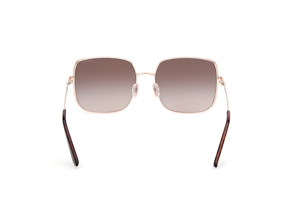 Occhiali da sole Guess GU00194 (28F) colore oro rosé lucido forma quadrato lenti marrone sfumato