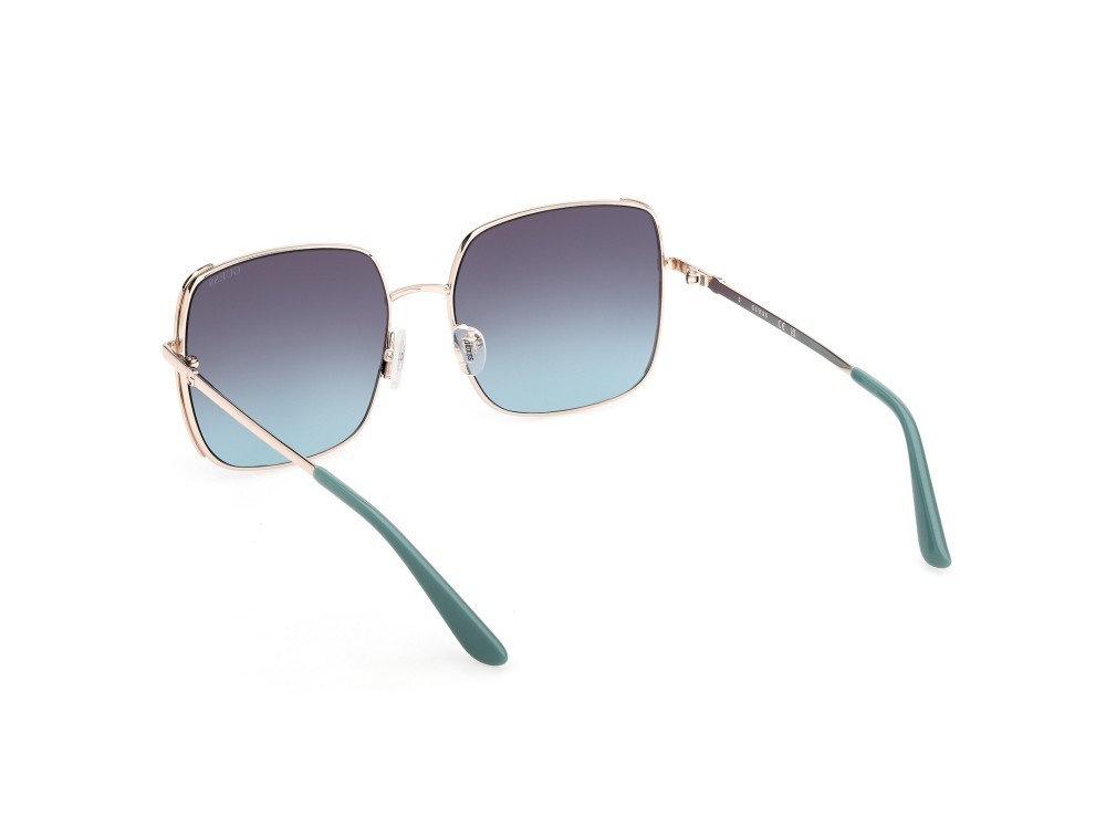 Occhiali da sole Guess GU00194 (33W) colore oro pallido lucido forma quadrato lenti blu sfumato