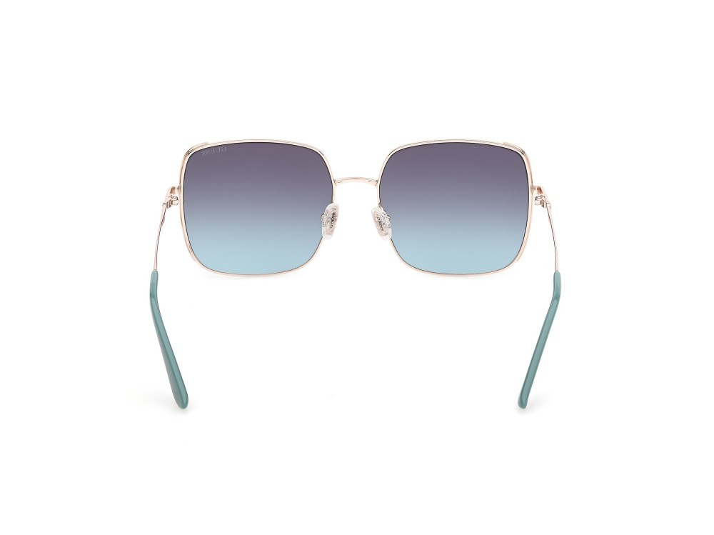 Occhiali da sole Guess GU00194 (33W) colore oro pallido lucido forma quadrato lenti blu sfumato