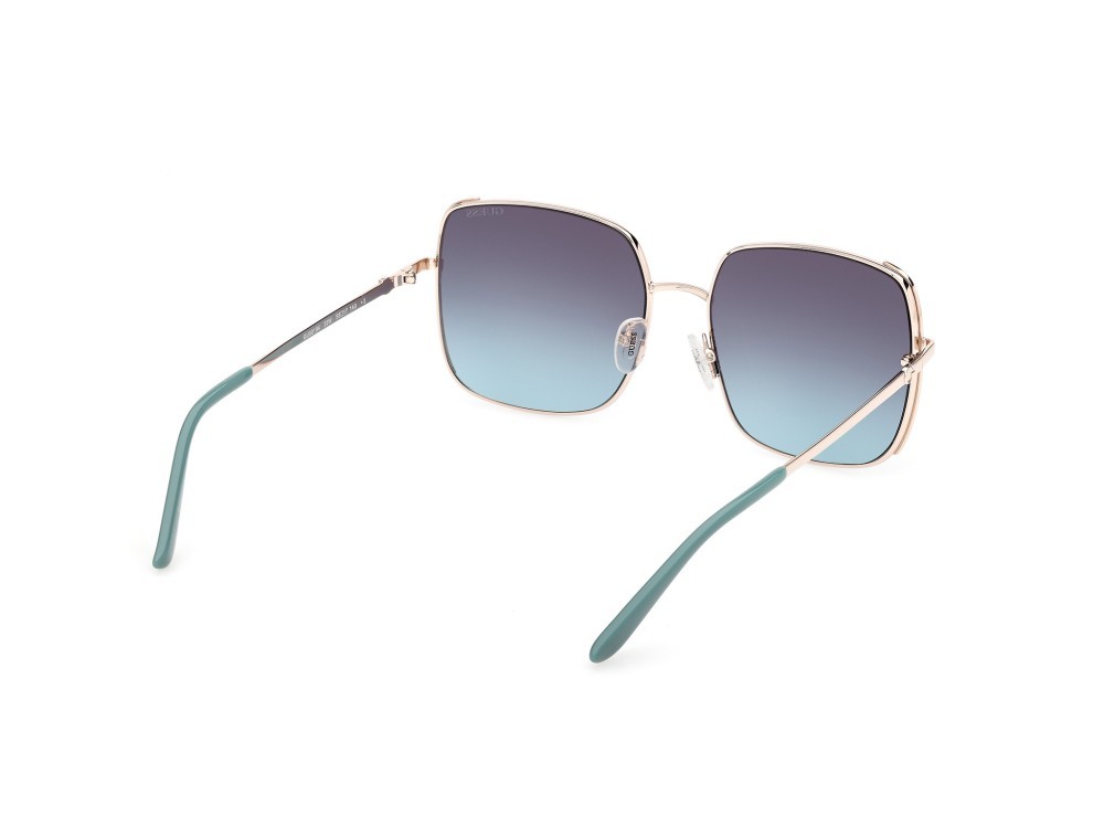 Occhiali da sole Guess GU00194 (33W) colore oro pallido lucido forma quadrato lenti blu sfumato