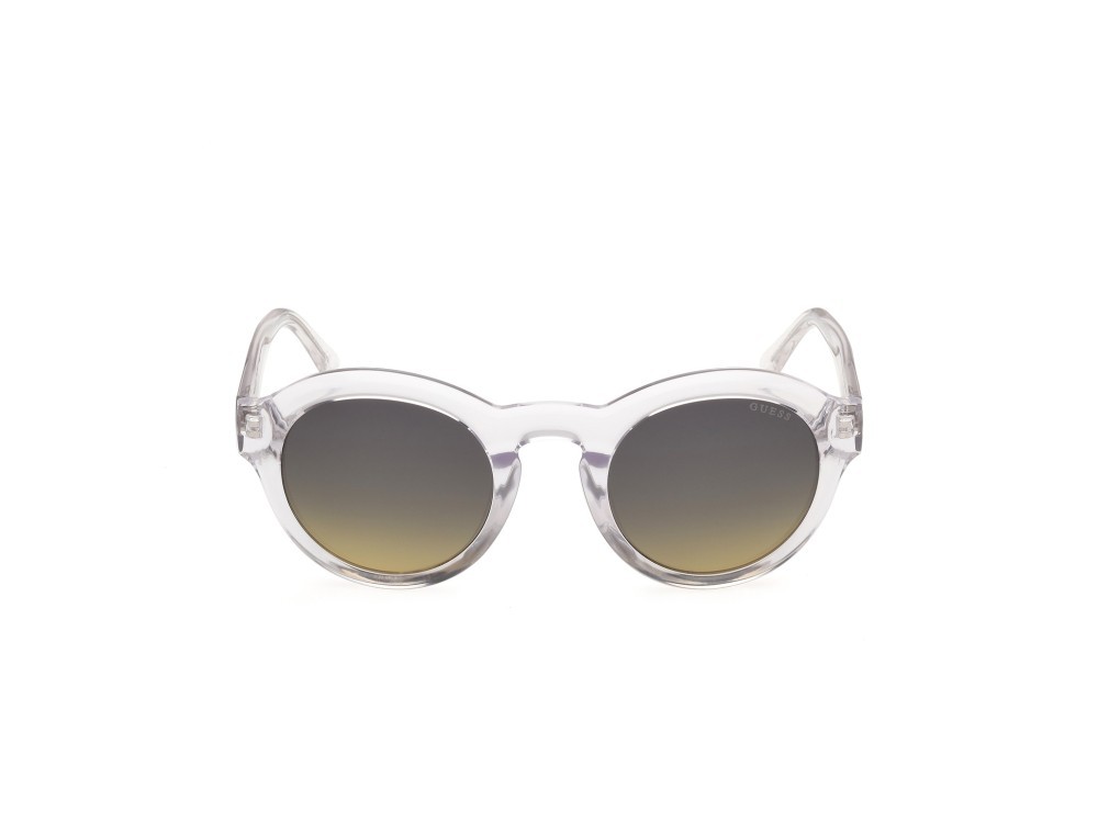 Occhiali da sole Guess GU00205 (26W) colore cristallo / giallo chiaro lucido forma rotondo lenti blu sfumato