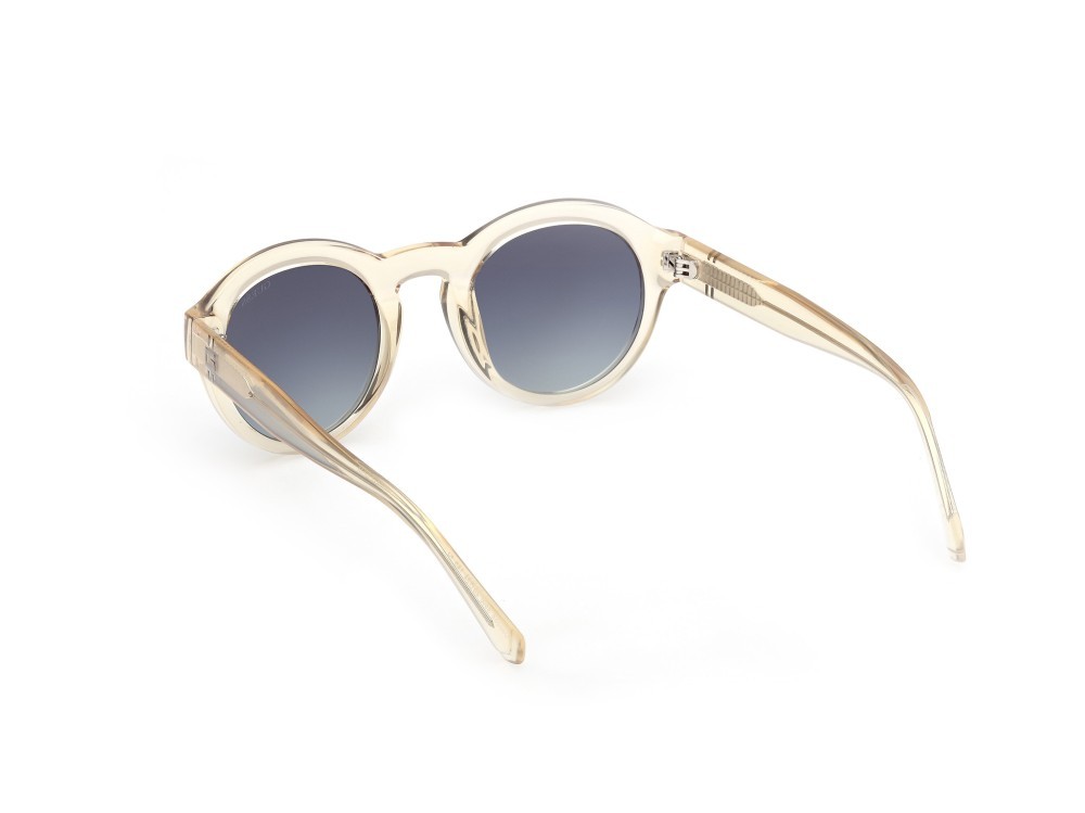 Occhiali da sole Guess GU00205 (39W) colore giallo chiaro lucido forma rotondo lenti blu sfumato
