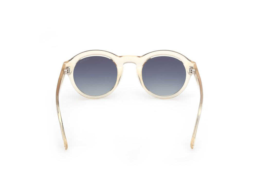 Occhiali da sole Guess GU00205 (39W) colore giallo chiaro lucido forma rotondo lenti blu sfumato