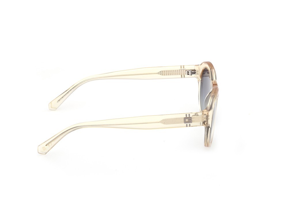 Occhiali da sole Guess GU00205 (39W) colore giallo chiaro lucido forma rotondo lenti blu sfumato