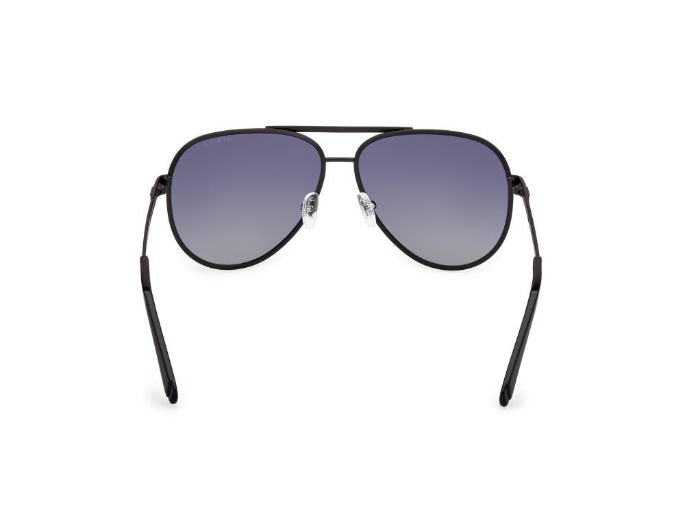 Occhiali da sole Guess GU00209 (02D) colore nero opaco forma aviator lenti fumo polar.
