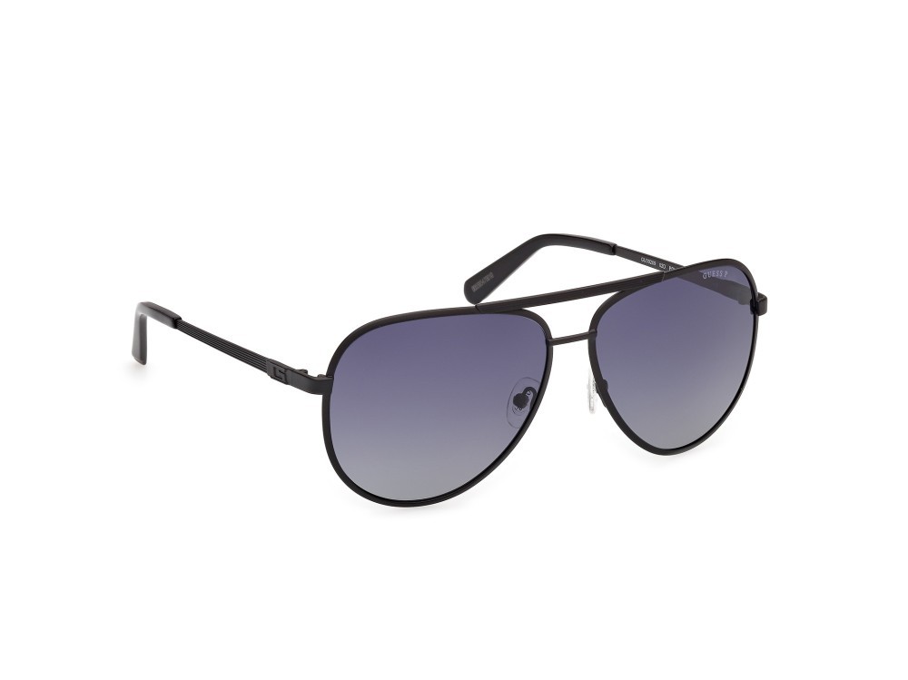 Occhiali da sole Guess GU00209 (02D) colore nero opaco forma aviator lenti fumo polar.