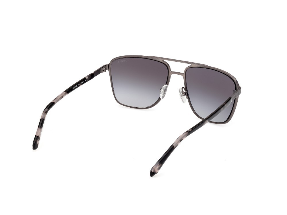 Occhiali da sole Guess GU00210 (07B) colore rutenio scuro satinato lucido  forma navigator lenti fumo grad.