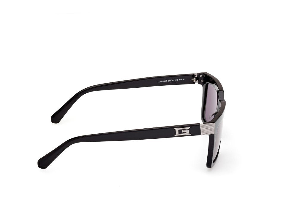 Occhiali da sole Guess GU00213 (01Y) colore nero lucido forma rettangolare lenti viola