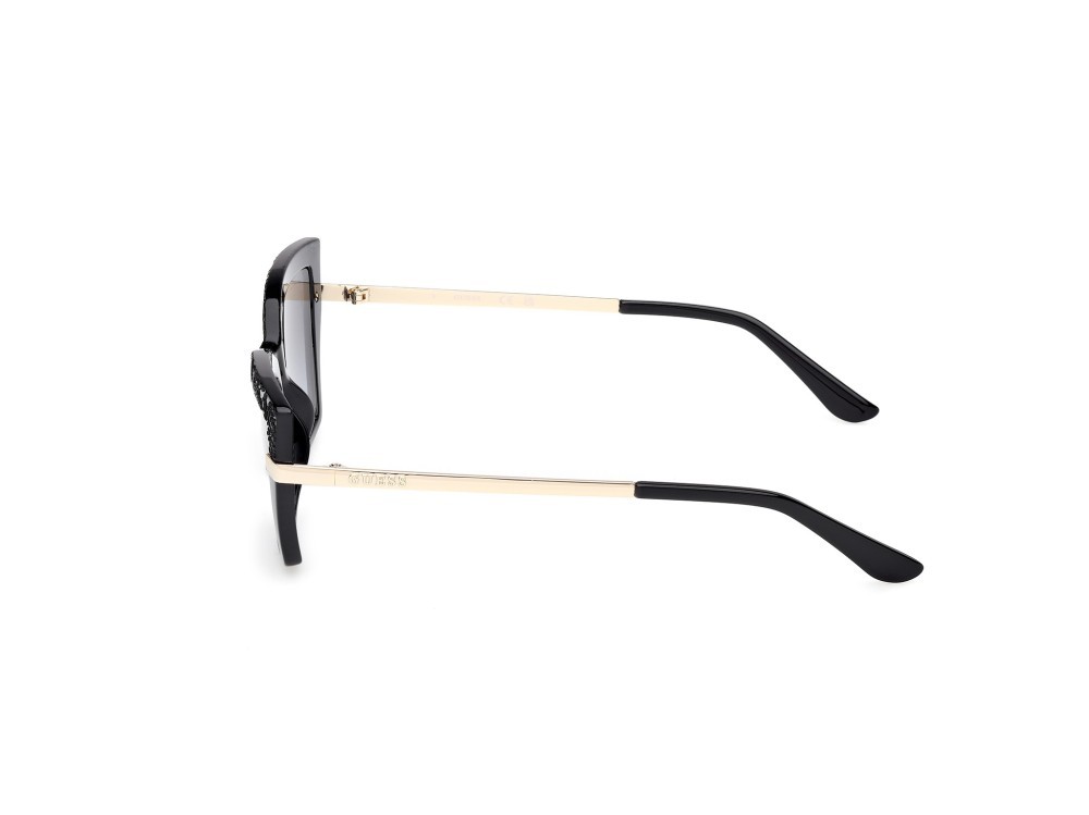 Occhiali da sole Guess GU00216 (01B) colore nero lucido - oro pallido lucido forma cat eye lenti fumo grad.