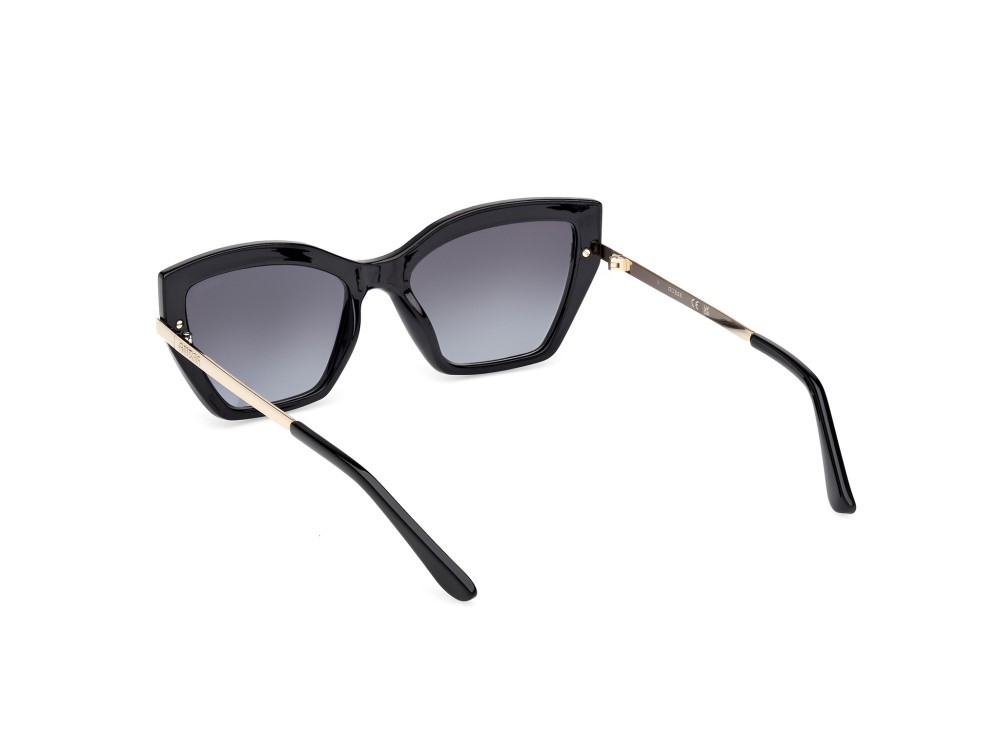 Occhiali da sole Guess GU00216 (01B) colore nero lucido - oro pallido lucido forma cat eye lenti fumo grad.