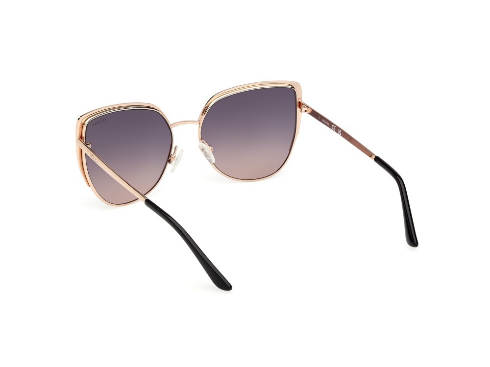Occhiali da sole Guess GU00217 (05B) colore oro rosé lucido forma cat eye lenti fumo grad.
