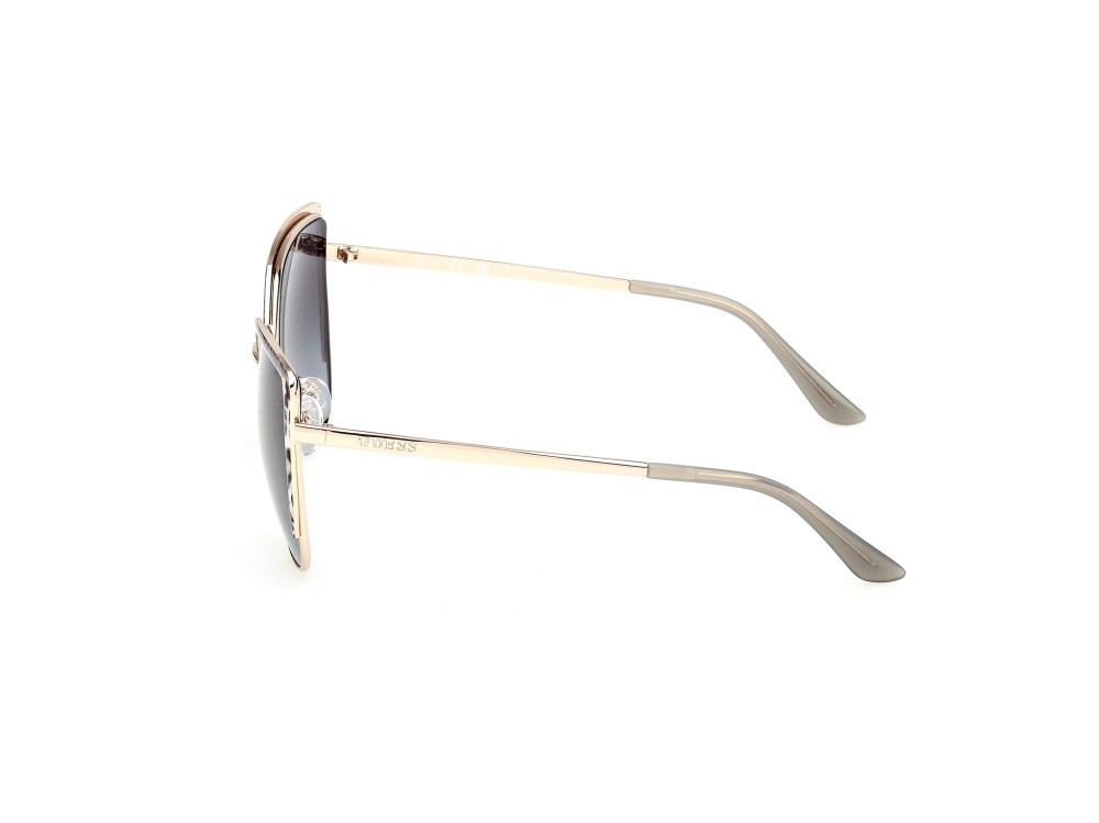 Occhiali da sole Guess GU00217 (32B) colore  oro pallido lucido forma cat eye lenti fumo grad.